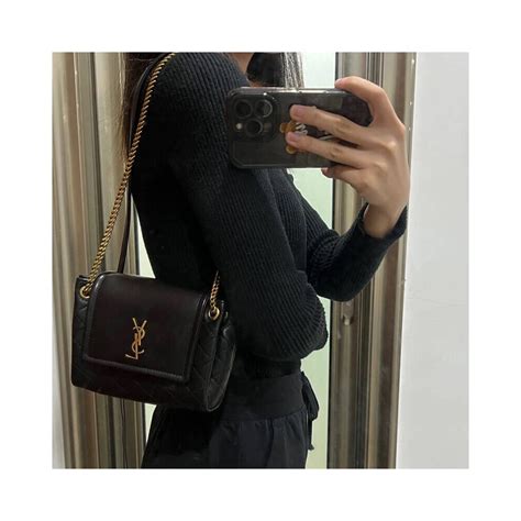 Nolita Mini leather shoulder bag in black .